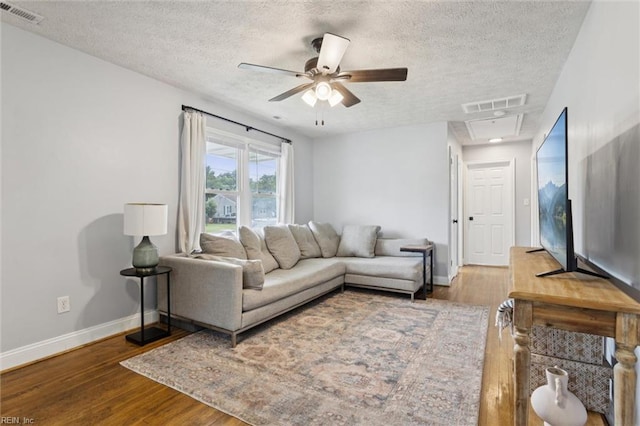27 Aspenwood Dr, Hampton, VA 23666 - living area featuring wood finished floors, a textured ceiling, ceiling fan, and attic access