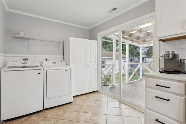 27 Aspenwood Dr, Hampton, VA 23666 - washroom with cabinet space, light tile patterned floors, washing machine and clothes dryer, and ornamental molding