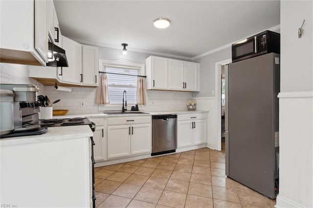 27 Aspenwood Dr, Hampton, VA 23666 - kitchen featuring appliances with stainless steel finishes, exhaust hood, white cabinetry, and ornamental molding