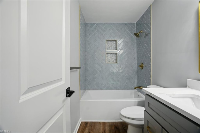 2317 Esplanade Dr, Virginia Beach, VA 23456 - bathroom with wood finished floors, vanity, and tub / shower combination