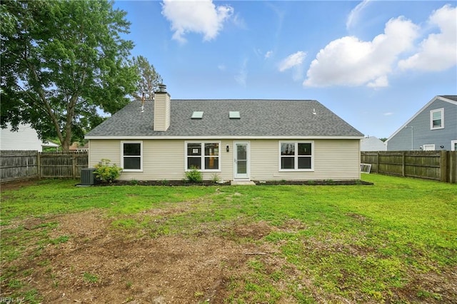 2317 Esplanade Dr, Virginia Beach, VA 23456 - rear view of property featuring a fenced backyard, a chimney, and roof with shingles