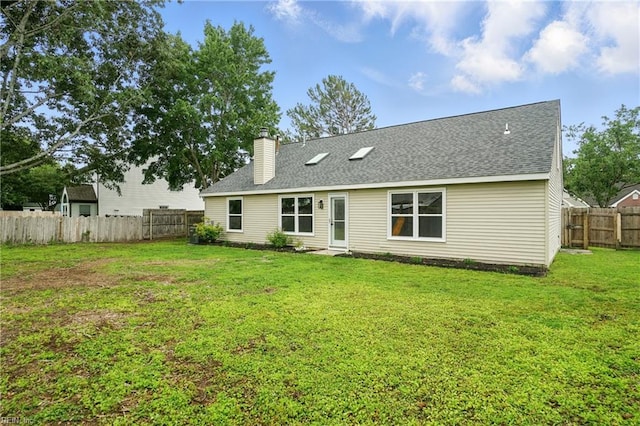 2317 Esplanade Dr, Virginia Beach, VA 23456 - rear view of property featuring a fenced backyard, a chimney, and roof with shingles