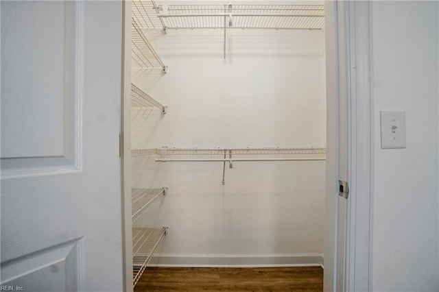 734 Gallbush Rd, Chesapeake, VA 23322 - spacious closet with dark wood-style flooring