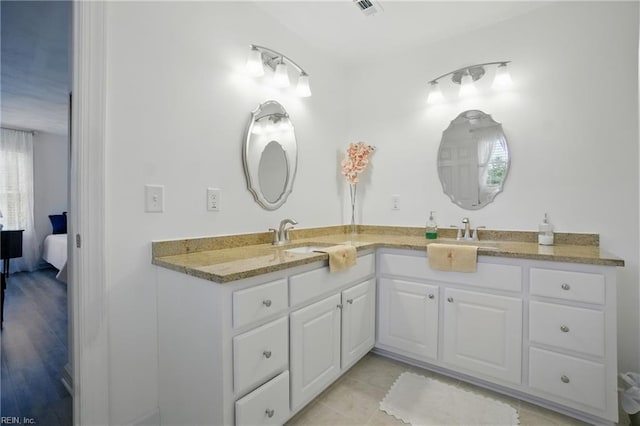 734 Gallbush Rd, Chesapeake, VA 23322 - ensuite bathroom with double vanity and tile patterned floors