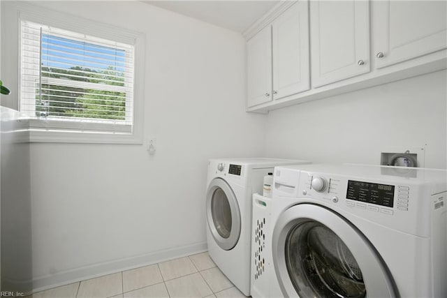 734 Gallbush Rd, Chesapeake, VA 23322 - laundry room with cabinet space, washer and dryer, and light tile patterned flooring