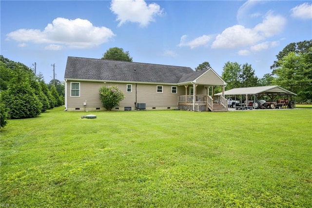 734 Gallbush Rd, Chesapeake, VA 23322 - rear view of house with crawl space, a detached carport, and a lawn