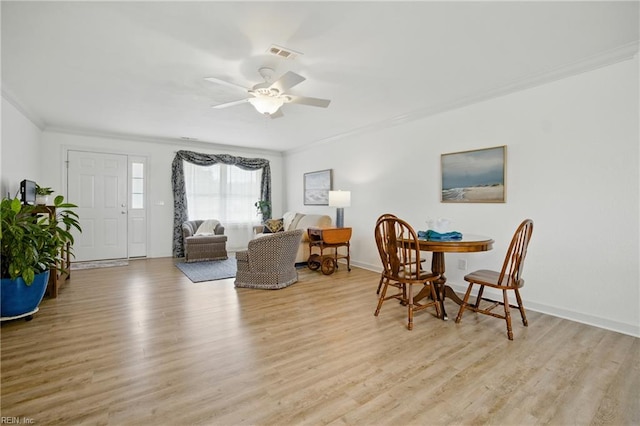 734 Gallbush Rd, Chesapeake, VA 23322 - dining area featuring ornamental molding, a ceiling fan, and light wood-style floors