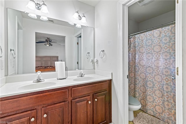 1508 Big Bethel Rd, Hampton, VA 23666 - bathroom featuring double vanity and a ceiling fan