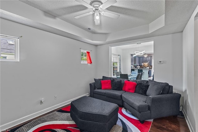 1508 Big Bethel Rd, Hampton, VA 23666 - living room with a ceiling fan, a textured ceiling, wood finished floors, and a chandelier