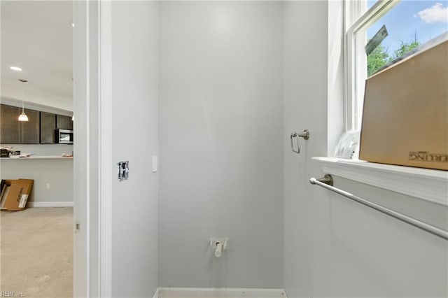 732 Birch Ave, Hampton, VA 23661 - bathroom with concrete floors and baseboards