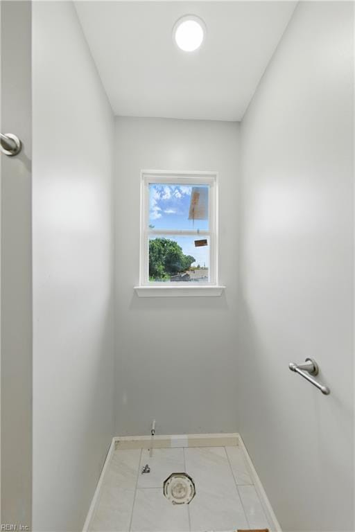 732 Birch Ave, Hampton, VA 23661 - washroom featuring baseboards and light marble finish flooring