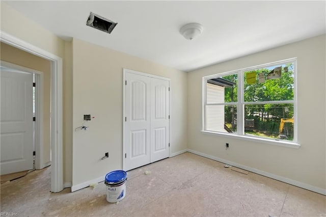 732 Birch Ave, Hampton, VA 23661 - unfurnished bedroom featuring multiple windows and a closet