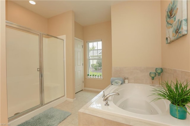 911 Vineyard Pl Unit # C, Suffolk, VA 23435 - bathroom featuring a stall shower, a jetted tub, and tile patterned floors