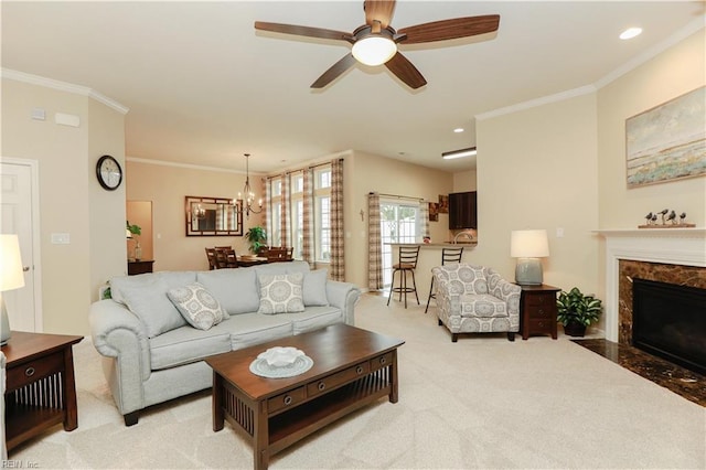 911 Vineyard Pl Unit # C, Suffolk, VA 23435 - carpeted living room featuring crown molding, a chandelier, ceiling fan, a premium fireplace, and recessed lighting