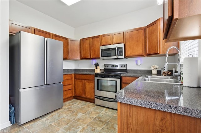 3116 Weathers Blvd, Toano, VA 23168 - kitchen featuring stainless steel appliances and brown cabinets