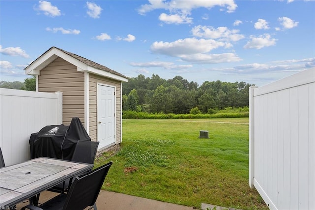 3116 Weathers Blvd, Toano, VA 23168 - view of grassy yard featuring outdoor dining area, a shed, and a patio