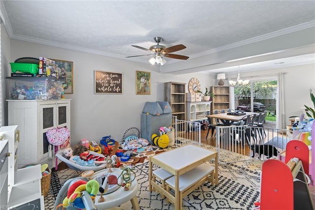 102 Dogwood Dr, Williamsburg, VA 23185 - rec room featuring a chandelier, a ceiling fan, ornamental molding, and wood finished floors