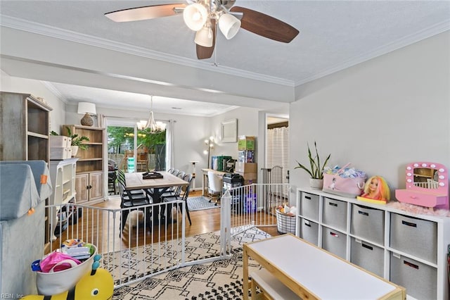 102 Dogwood Dr, Williamsburg, VA 23185 - playroom with a ceiling fan, a chandelier, wood finished floors, and crown molding