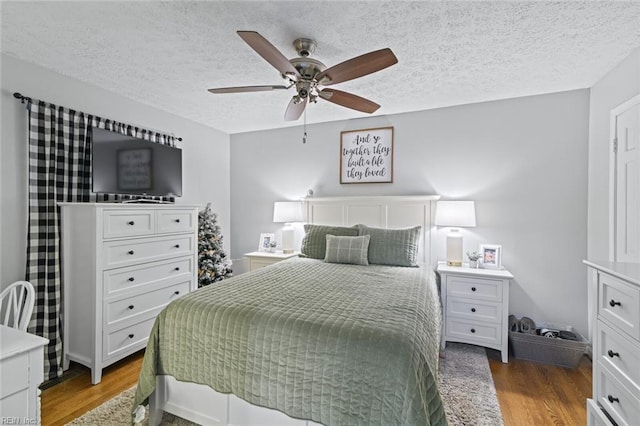 102 Dogwood Dr, Williamsburg, VA 23185 - bedroom with wood finished floors, a textured ceiling, and ceiling fan