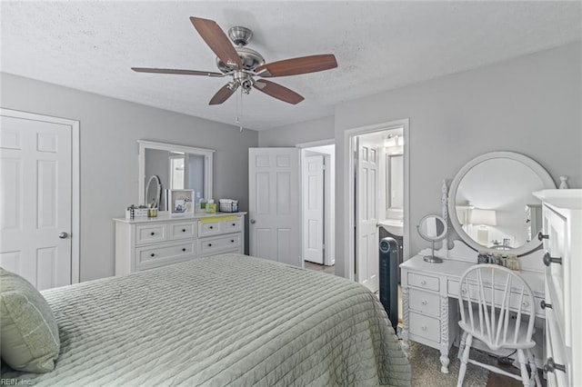 102 Dogwood Dr, Williamsburg, VA 23185 - bedroom featuring a textured ceiling, ceiling fan, and connected bathroom