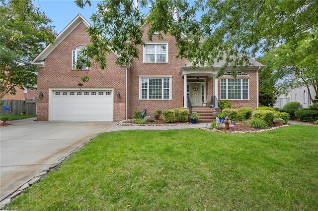 2224 Cabot Ct, Virginia Beach, VA 23456 - view of front of house featuring concrete driveway, a garage, and brick siding