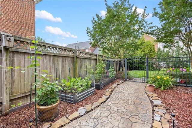 2224 Cabot Ct, Virginia Beach, VA 23456 - view of patio with a garden and a gate