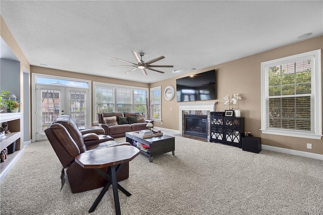 2224 Cabot Ct, Virginia Beach, VA 23456 - living room with carpet floors, french doors, a high end fireplace, ceiling fan, and a textured ceiling