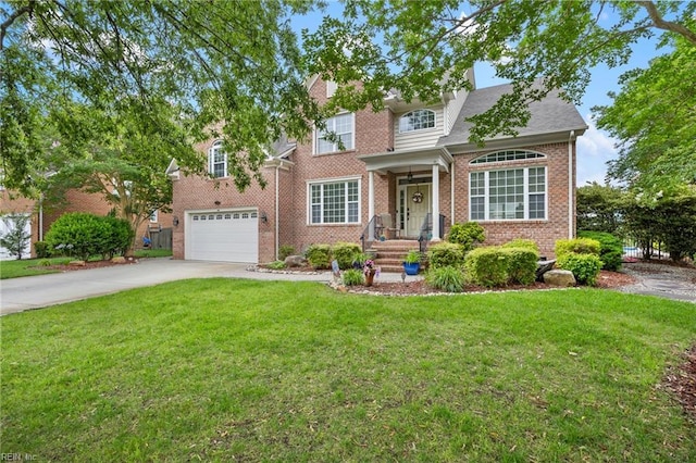 2224 Cabot Ct, Virginia Beach, VA 23456 - traditional home with driveway, a front yard, and brick siding