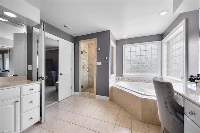 2224 Cabot Ct, Virginia Beach, VA 23456 - ensuite bathroom with vanity, a whirlpool tub, a stall shower, and tile patterned floors