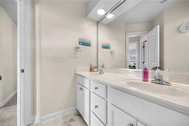 2224 Cabot Ct, Virginia Beach, VA 23456 - bathroom featuring double vanity and marble look tiles