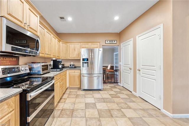 2060 Queens Point Dr, Suffolk, VA 23434 - kitchen featuring stainless steel appliances, light brown cabinets, recessed lighting, and light countertops