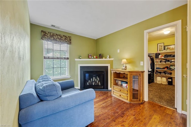 2060 Queens Point Dr, Suffolk, VA 23434 - living room with wood finished floors and a glass covered fireplace