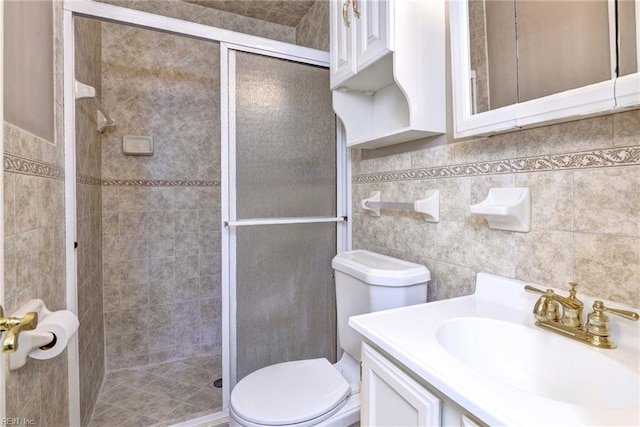 5 Yulee Ct, Hampton, VA 23669 - bathroom with a shower stall, vanity, and tile walls