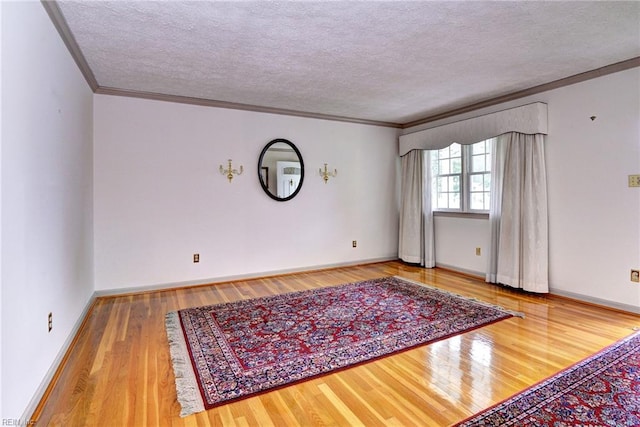 5 Yulee Ct, Hampton, VA 23669 - spare room featuring a textured ceiling, wood finished floors, and crown molding