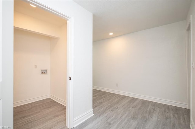 3760 Nansemond Pkwy, Suffolk, VA 23435 - laundry room featuring light wood-style flooring, recessed lighting, and washer hookup