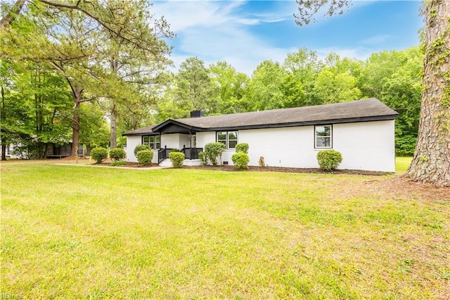 3760 Nansemond Pkwy, Suffolk, VA 23435 - view of front of home with a front lawn and a chimney