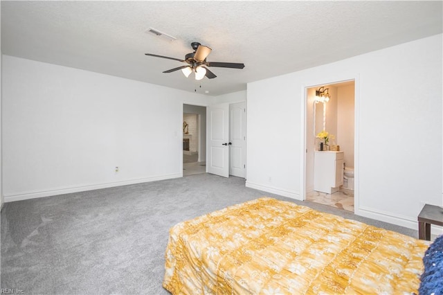 3760 Nansemond Pkwy, Suffolk, VA 23435 - unfurnished bedroom with light colored carpet, a textured ceiling, ensuite bath, and a ceiling fan