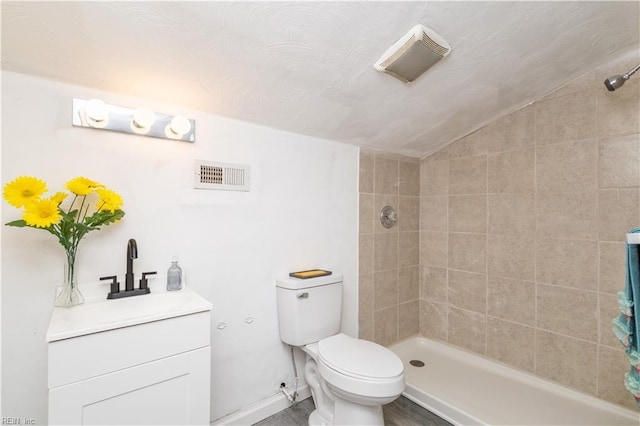 3760 Nansemond Pkwy, Suffolk, VA 23435 - bathroom with vanity, tiled shower, and lofted ceiling