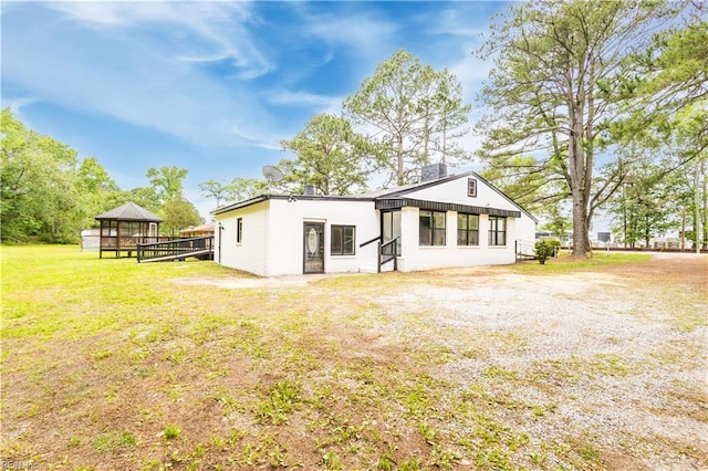 3760 Nansemond Pkwy, Suffolk, VA 23435 - rear view of house featuring a gazebo, a yard, and a chimney