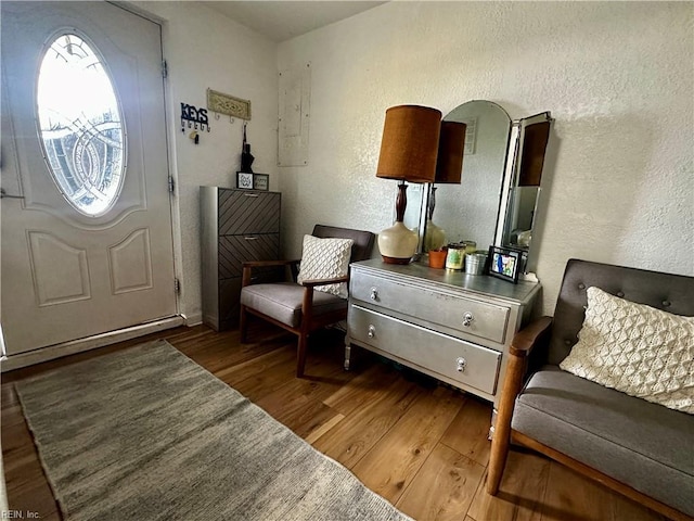 154 Tynes St, Suffolk, VA 23434 - foyer with wood finished floors and a textured wall