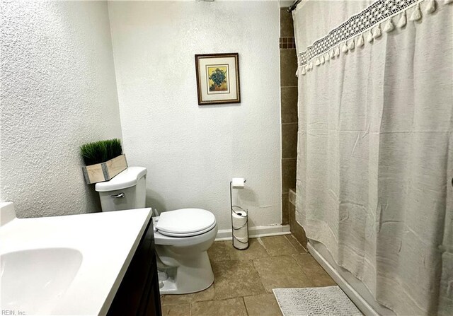 154 Tynes St, Suffolk, VA 23434 - full bath featuring vanity, shower / bath combination with curtain, and a textured wall