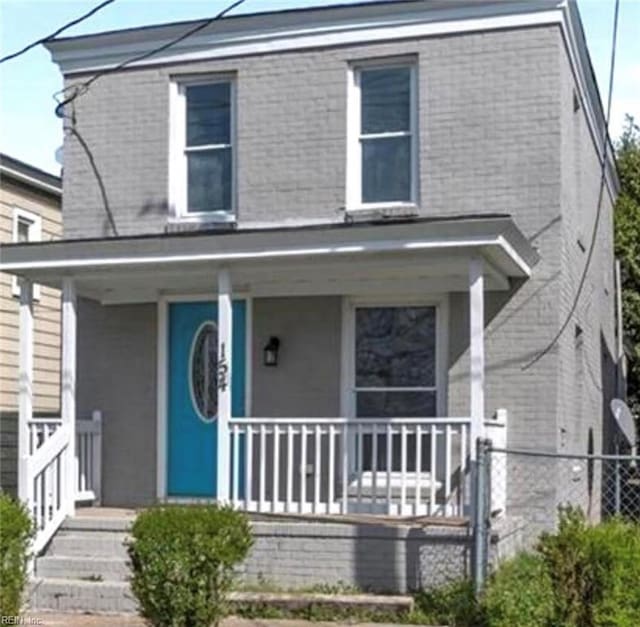 154 Tynes St, Suffolk, VA 23434 - view of front of house with a porch and brick siding