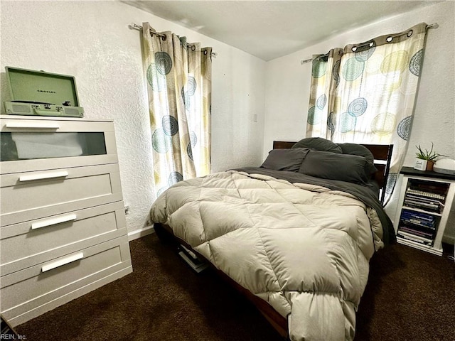 154 Tynes St, Suffolk, VA 23434 - bedroom with dark carpet and a textured wall