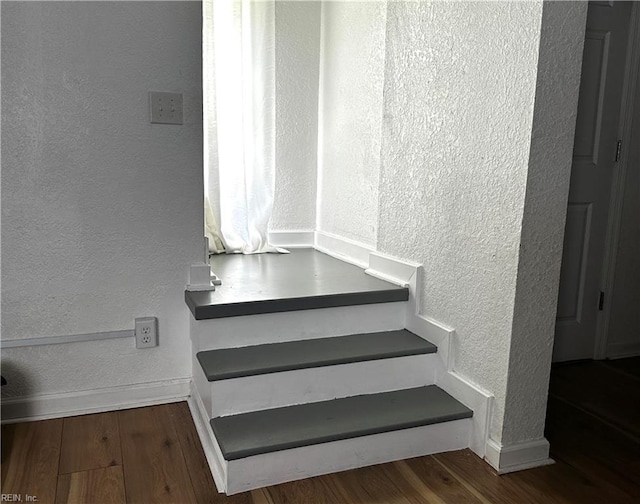 154 Tynes St, Suffolk, VA 23434 - staircase featuring a textured wall and wood finished floors