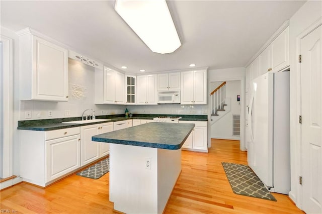 1904 Sandee Cres, Virginia Beach, VA 23454 - kitchen featuring white appliances, dark countertops, white cabinetry, and recessed lighting