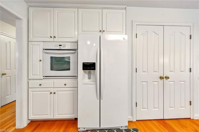 1904 Sandee Cres, Virginia Beach, VA 23454 - kitchen featuring white appliances, light wood-style floors, and white cabinets