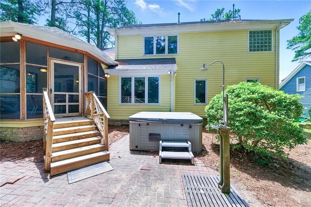 1904 Sandee Cres, Virginia Beach, VA 23454 - back of house with a hot tub, a patio, and a sunroom