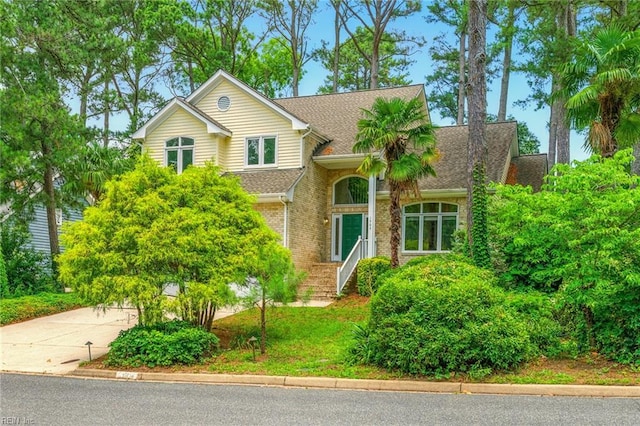1904 Sandee Cres, Virginia Beach, VA 23454 - view of front of house featuring roof with shingles, brick siding, and concrete driveway
