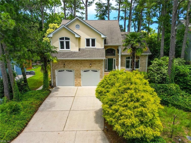 1904 Sandee Cres, Virginia Beach, VA 23454 - view of front of property with an attached garage, brick siding, concrete driveway, and a shingled roof