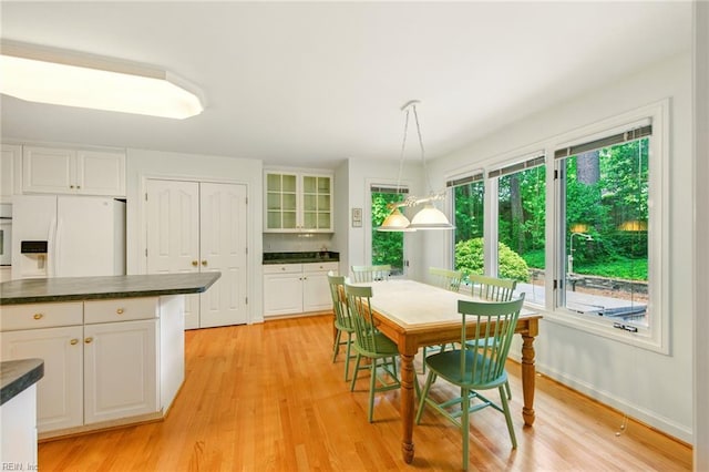1904 Sandee Cres, Virginia Beach, VA 23454 - dining area with light wood-style flooring and baseboards